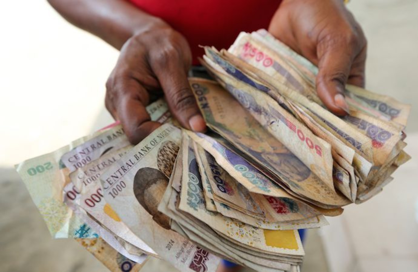 Naira Hits Record Low on Official & Black Market